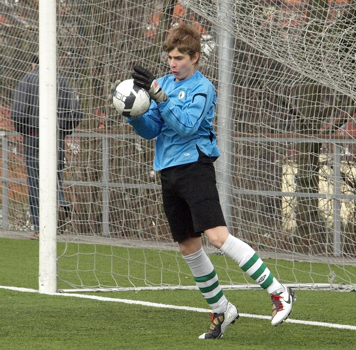 Míč bezpečně v moci naše brankáře M. Bartůňka